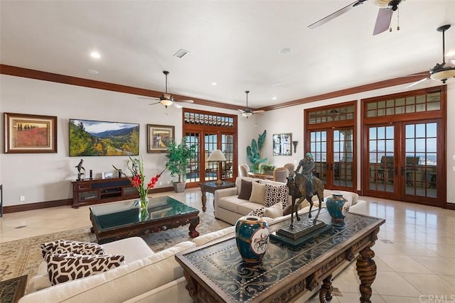 tiled living room featuring ceiling fan, french doors, and ornamental molding