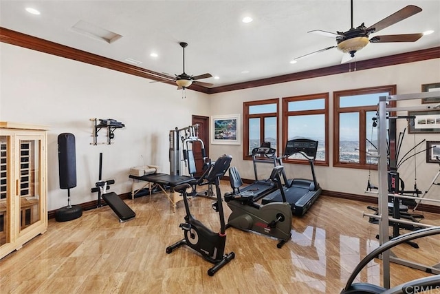 exercise area with ceiling fan, crown molding, light hardwood / wood-style flooring, and french doors