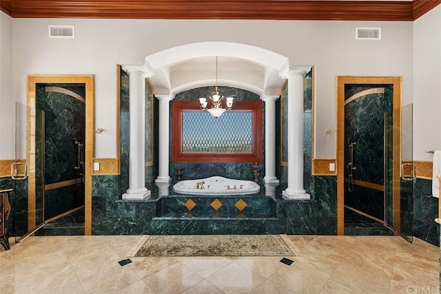 bathroom featuring tile flooring, a notable chandelier, shower with separate bathtub, and ornate columns