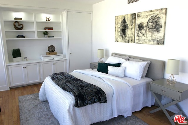 bedroom featuring hardwood / wood-style flooring