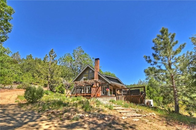 view of front of house featuring a deck