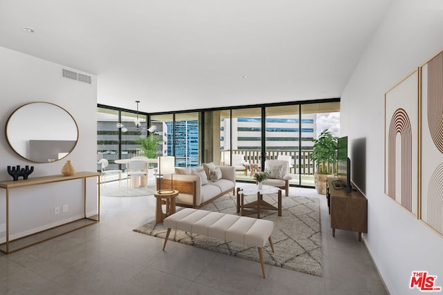 tiled living room with a wall of windows