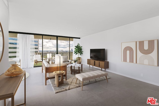 tiled living room featuring floor to ceiling windows