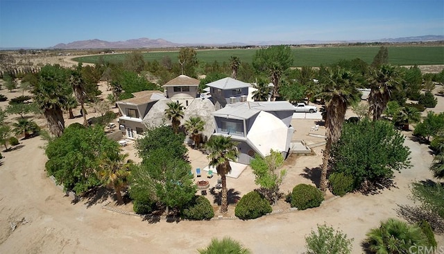 drone / aerial view featuring a mountain view