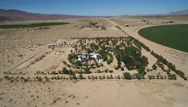 bird's eye view featuring a mountain view and a rural view