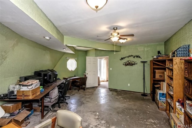 interior space with concrete floors and ceiling fan