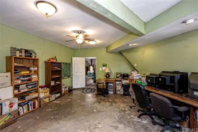 office with ceiling fan, concrete flooring, and beamed ceiling