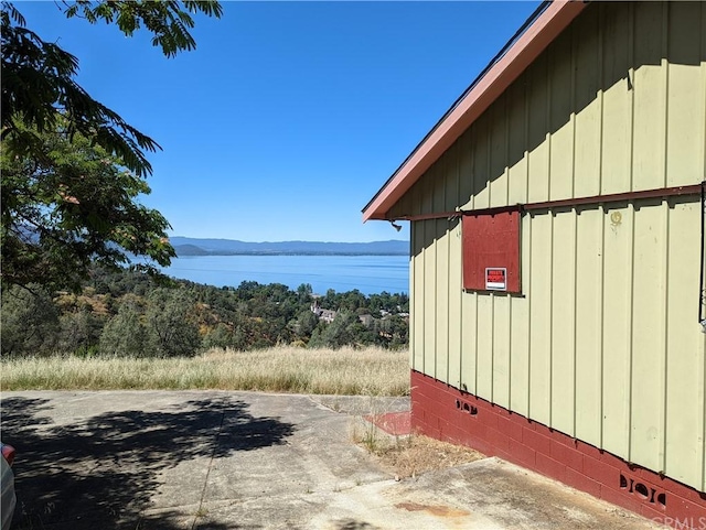 view of home's exterior featuring a water view