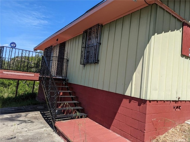 view of property exterior featuring a patio area