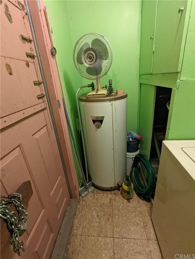 utility room featuring washer / clothes dryer and gas water heater