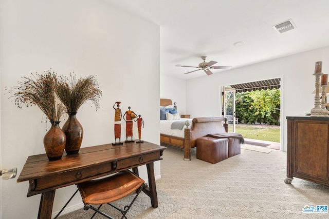 bedroom featuring light colored carpet