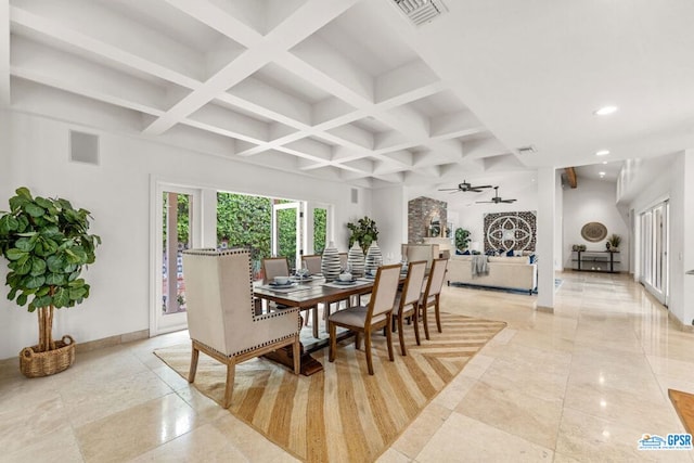 dining room with ceiling fan, beamed ceiling, and coffered ceiling