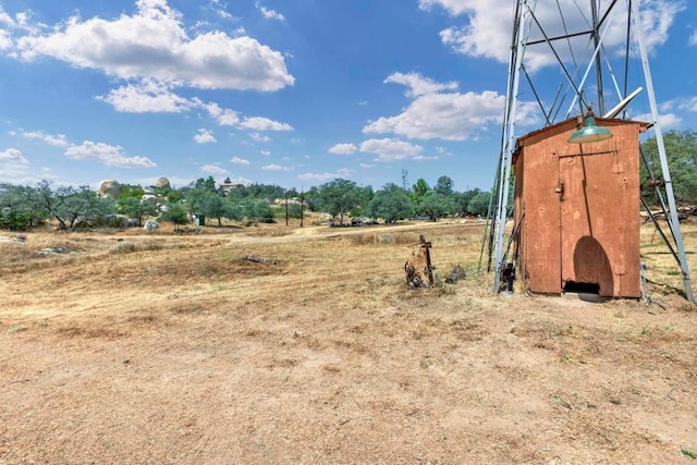 exterior space with a rural view