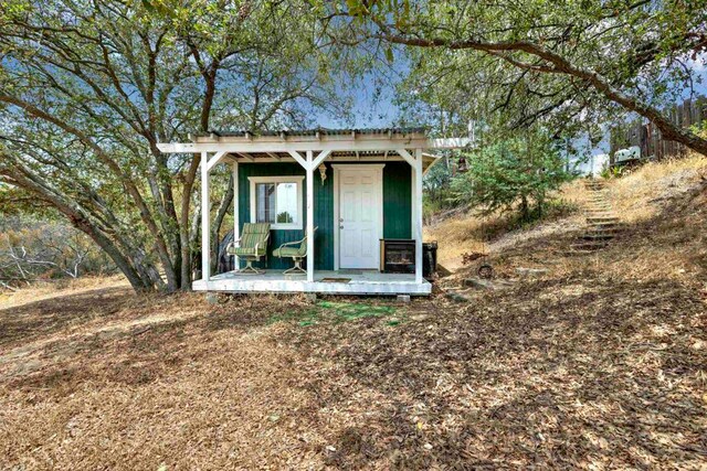 view of outbuilding with an outdoor structure