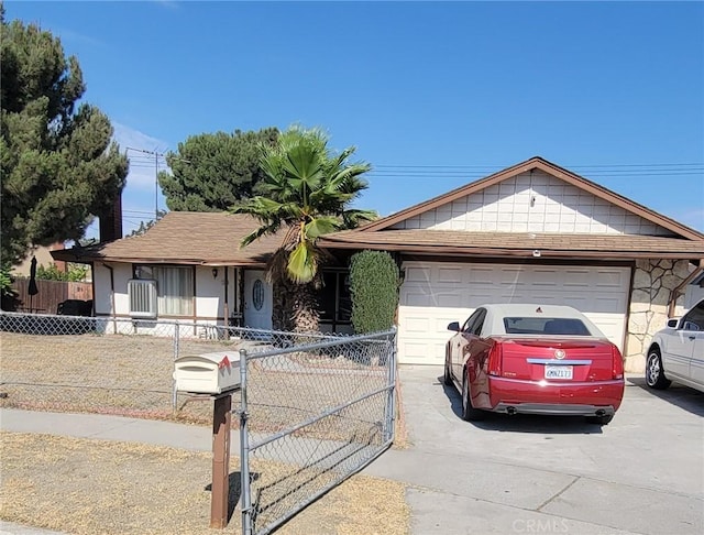 ranch-style house featuring a garage