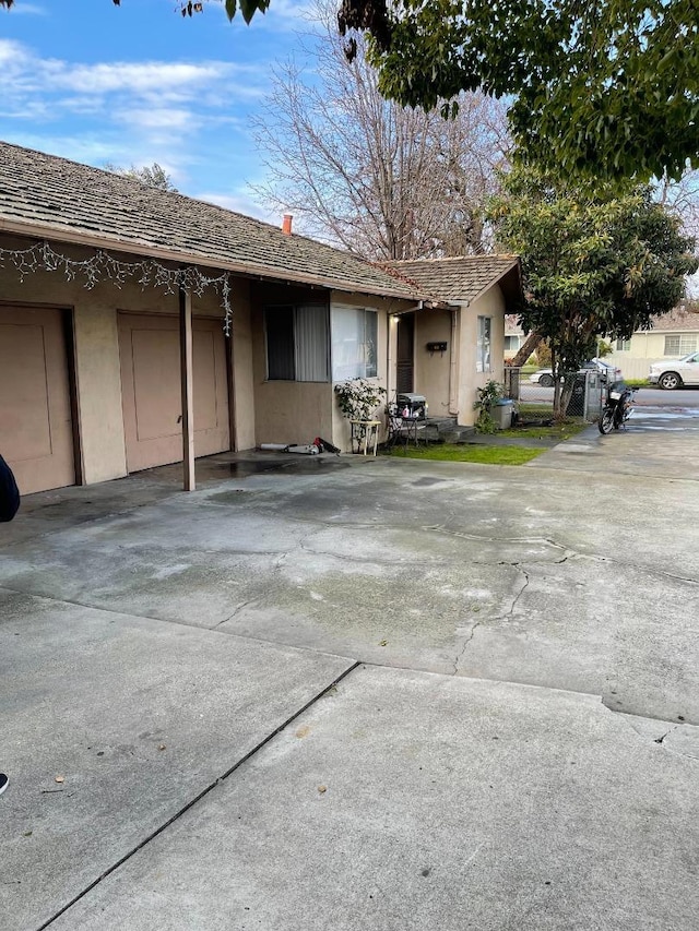 ranch-style house featuring a garage