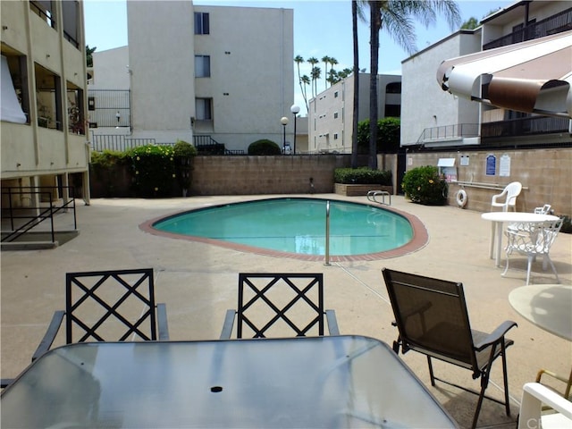 view of pool with a patio