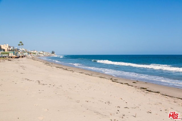 property view of water featuring a view of the beach