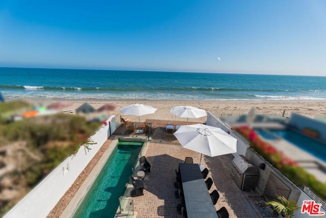 water view featuring a beach view