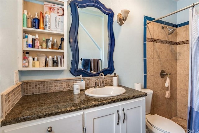 bathroom featuring tasteful backsplash, curtained shower, oversized vanity, and toilet