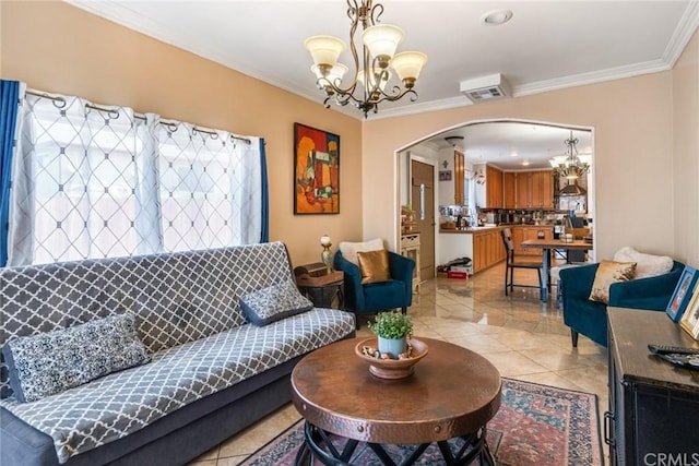 living room with light tile flooring, a notable chandelier, and crown molding