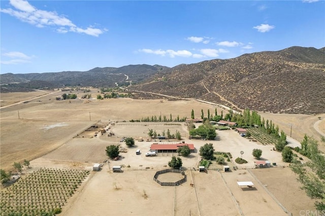 aerial view featuring a rural view and a mountain view