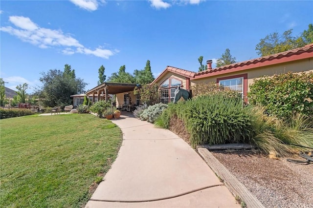 view of front of home featuring a front yard