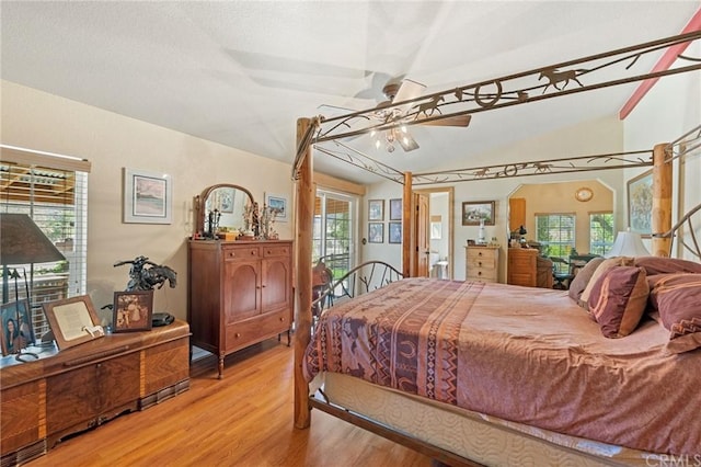 bedroom with ceiling fan, light wood-type flooring, and multiple windows