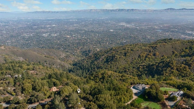 drone / aerial view featuring a mountain view