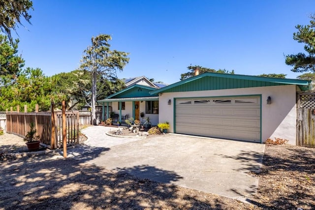 view of front of property featuring a garage