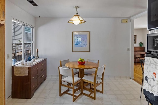 view of tiled dining area