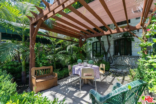 view of patio / terrace featuring a pergola