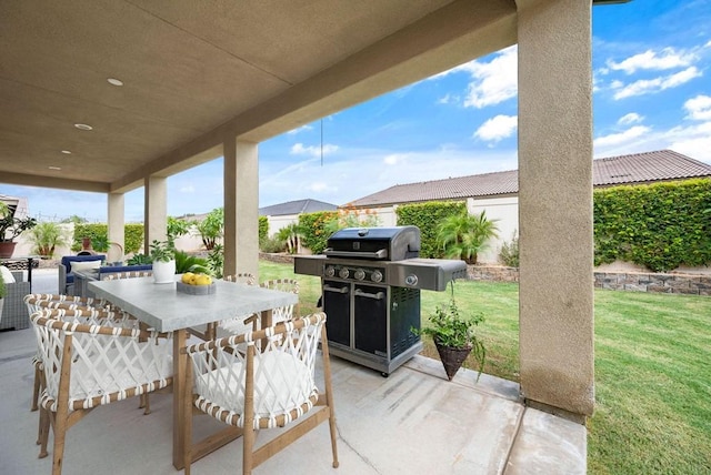 view of terrace featuring a grill