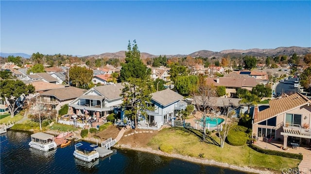 aerial view with a water and mountain view