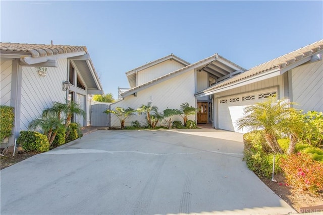 view of side of home with a garage