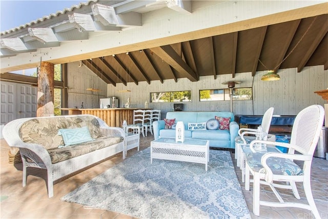 view of patio featuring an outdoor hangout area and an outdoor bar