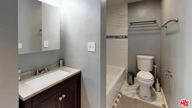 full bathroom featuring tiled shower / bath, toilet, vanity with extensive cabinet space, and tile floors