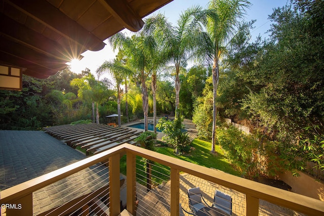 wooden deck with a yard