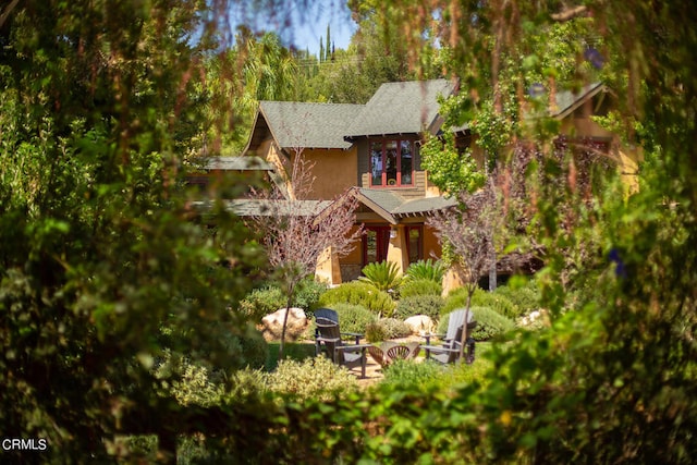 exterior space featuring a fire pit