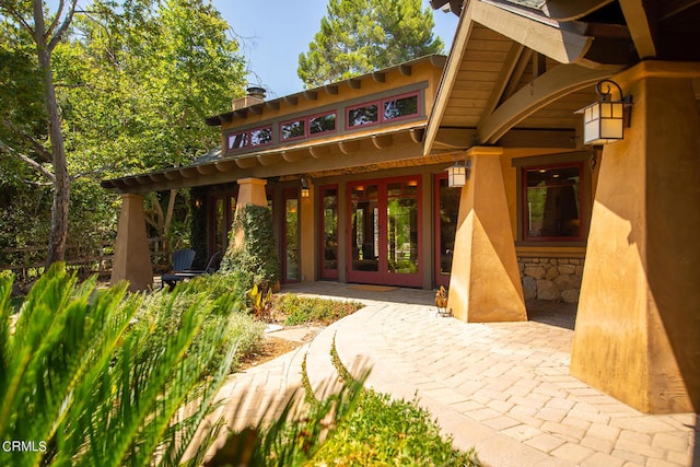 entrance to property featuring french doors