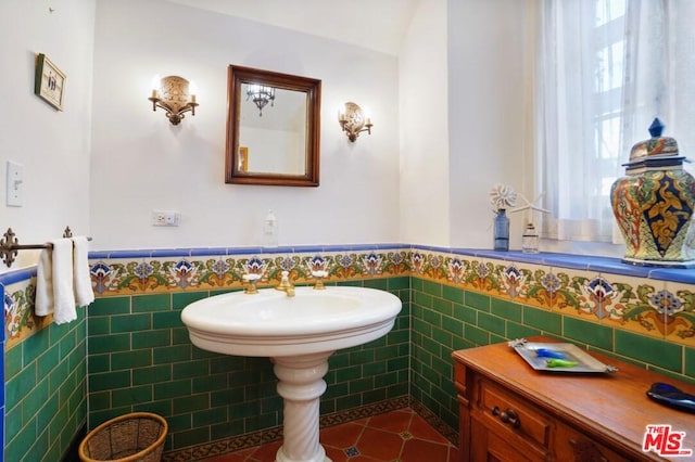 bathroom with tile walls and tile floors