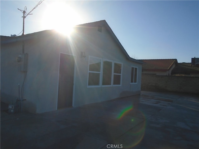 view of home's exterior featuring a patio area