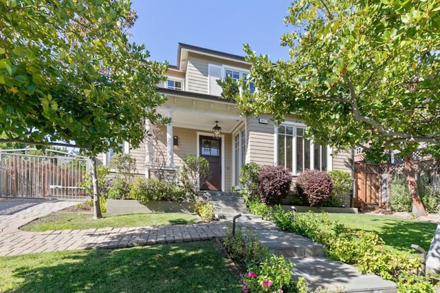 view of front of home featuring a front yard