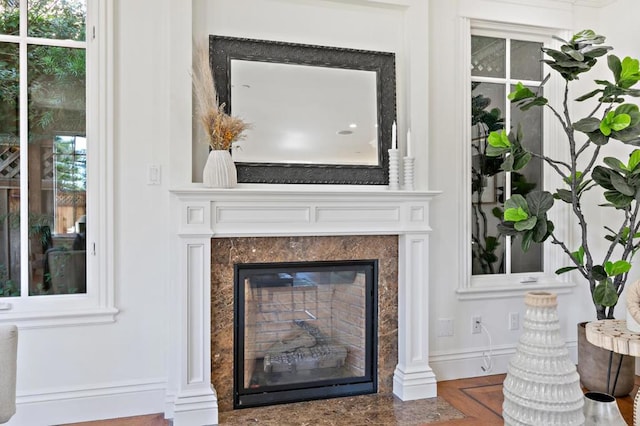 details featuring a high end fireplace