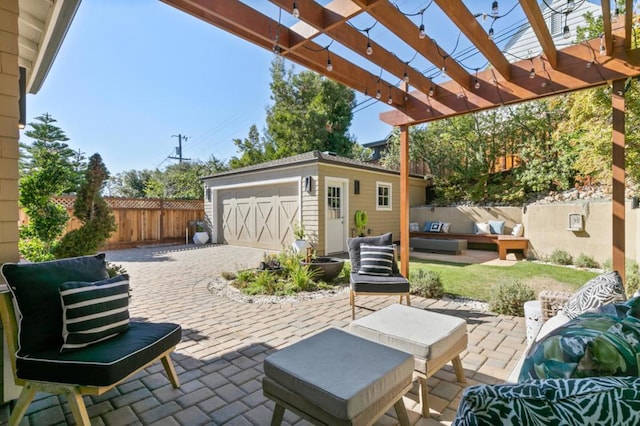 view of patio with outdoor lounge area, a garage, a pergola, and an outbuilding