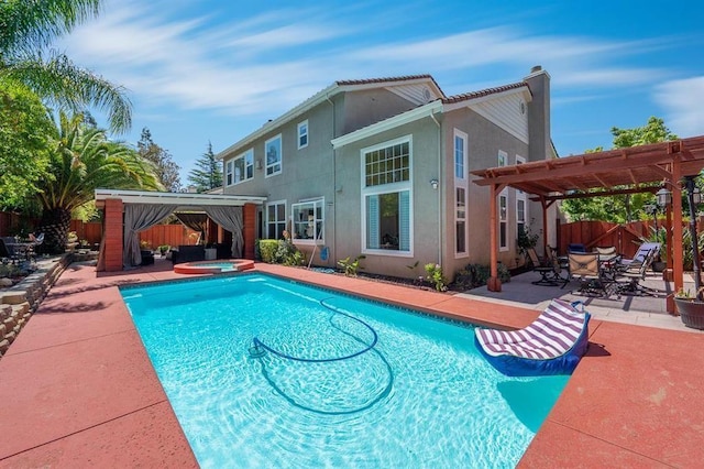 view of swimming pool with a pergola, a gazebo, an in ground hot tub, and a patio area