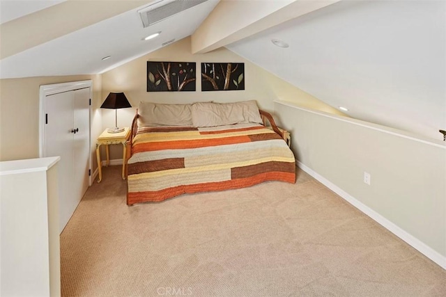 bedroom featuring light colored carpet and lofted ceiling with beams