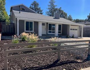 ranch-style house featuring a garage