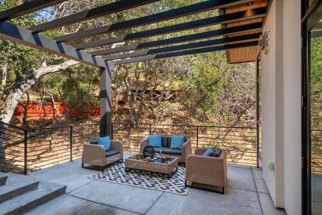 view of terrace featuring a pergola and an outdoor living space