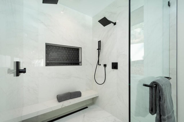 bathroom featuring tiled shower